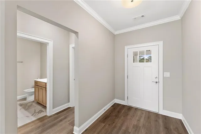 a bathroom with a sink toilet and vanity