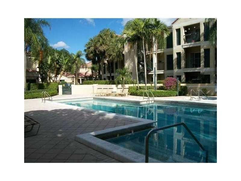 949 Riverside Drive, Unit 435 Coral Springs, FL 33071 - Photo 14 of 14 a view of a house with a yard