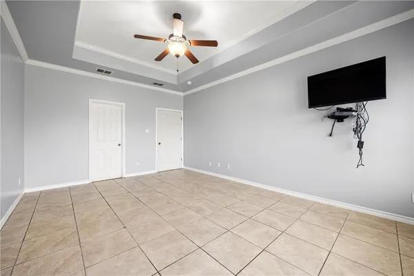 a view of room with ceiling fan