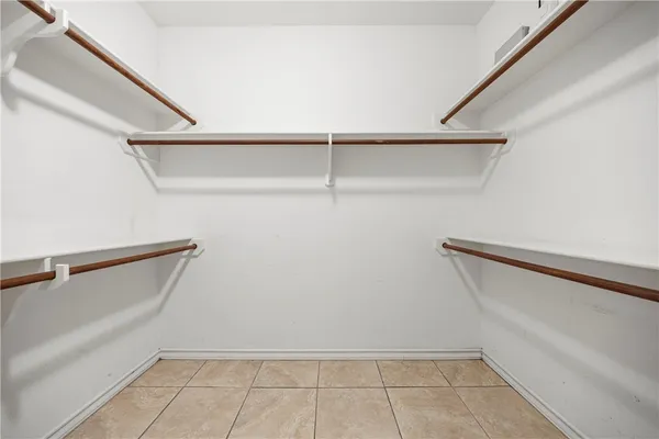 a view of an empty walk in closet