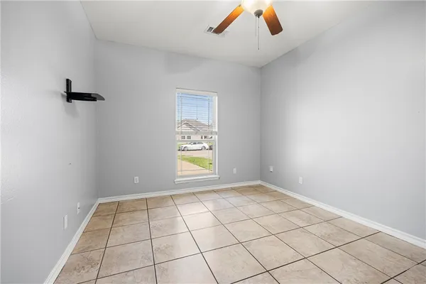 a house view with a garden space