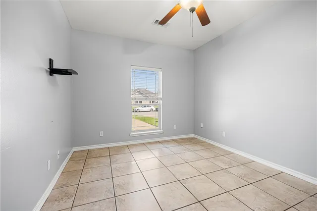 a house view with a garden space