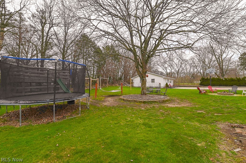 2819 Mayfair Road Akron, OH 44312 - Photo 44 of 49 View of yard featuring a trampoline