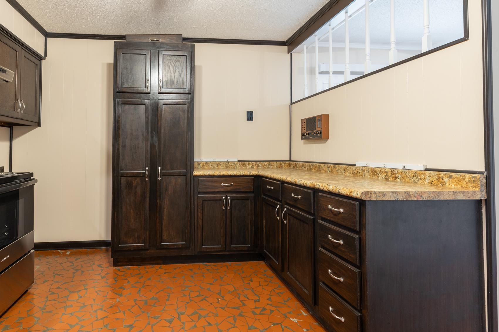 1820 West Holmes Road Memphis, TN 38109 - Photo 8 of 25 a kitchen with a refrigerator and a sink