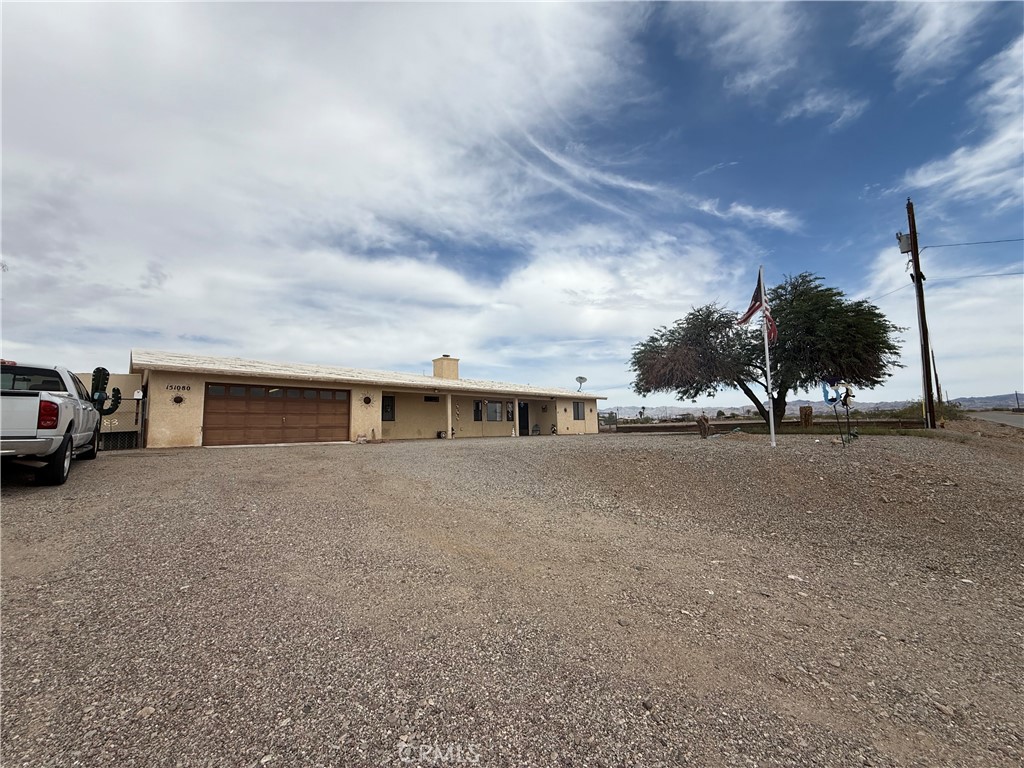 151080 Deerpath Road Big River, CA 92242 - Photo 23 of 24 a view of a house with a road