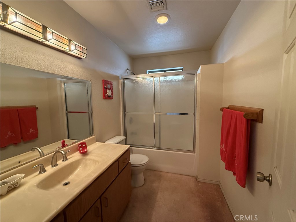 151080 Deerpath Road Big River, CA 92242 - Photo 7 of 24 a bathroom with a double vanity sink mirror and shower