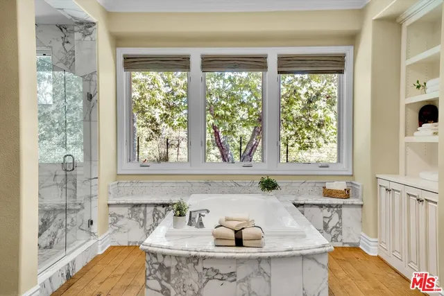 a bathroom with a sink and a shower