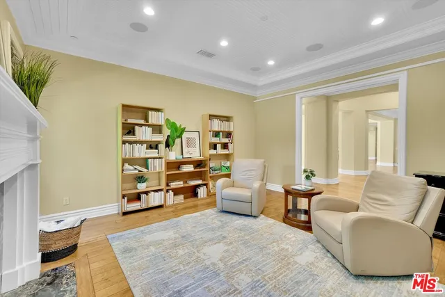 a view of a house with backyard porch and sitting area
