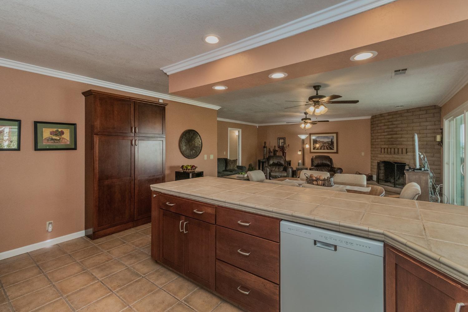 6233 South Armstrong Avenue Fowler, CA 93625 - Photo 13 of 30 a view of a double vanity sink mirror and outdoor space
