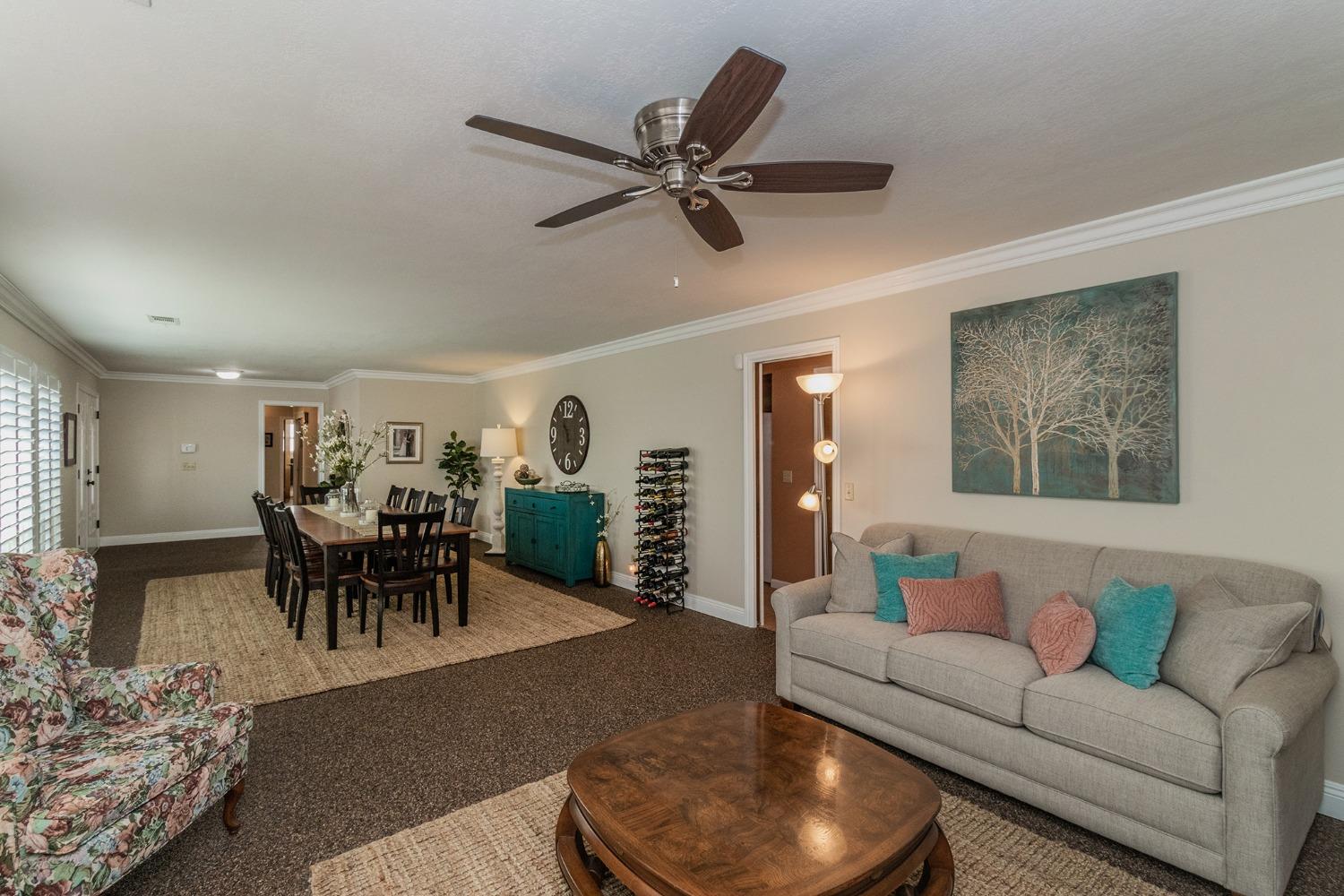 6233 South Armstrong Avenue Fowler, CA 93625 - Photo 6 of 30 a living room with furniture and wooden floor