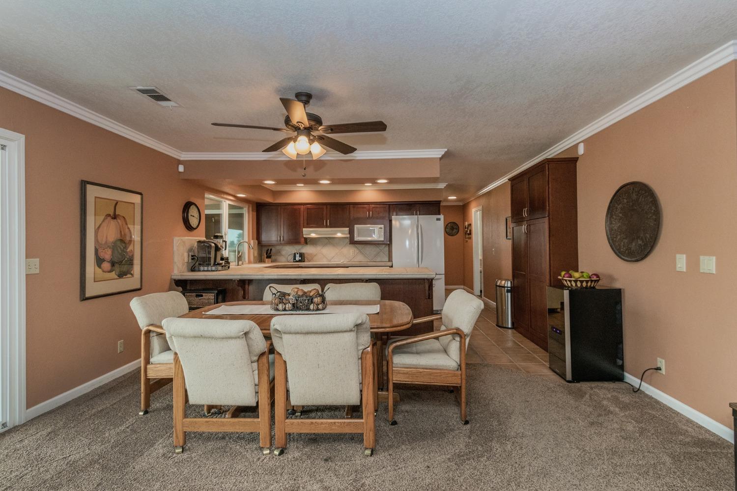6233 South Armstrong Avenue Fowler, CA 93625 - Photo 10 of 30 a dining room with furniture and window
