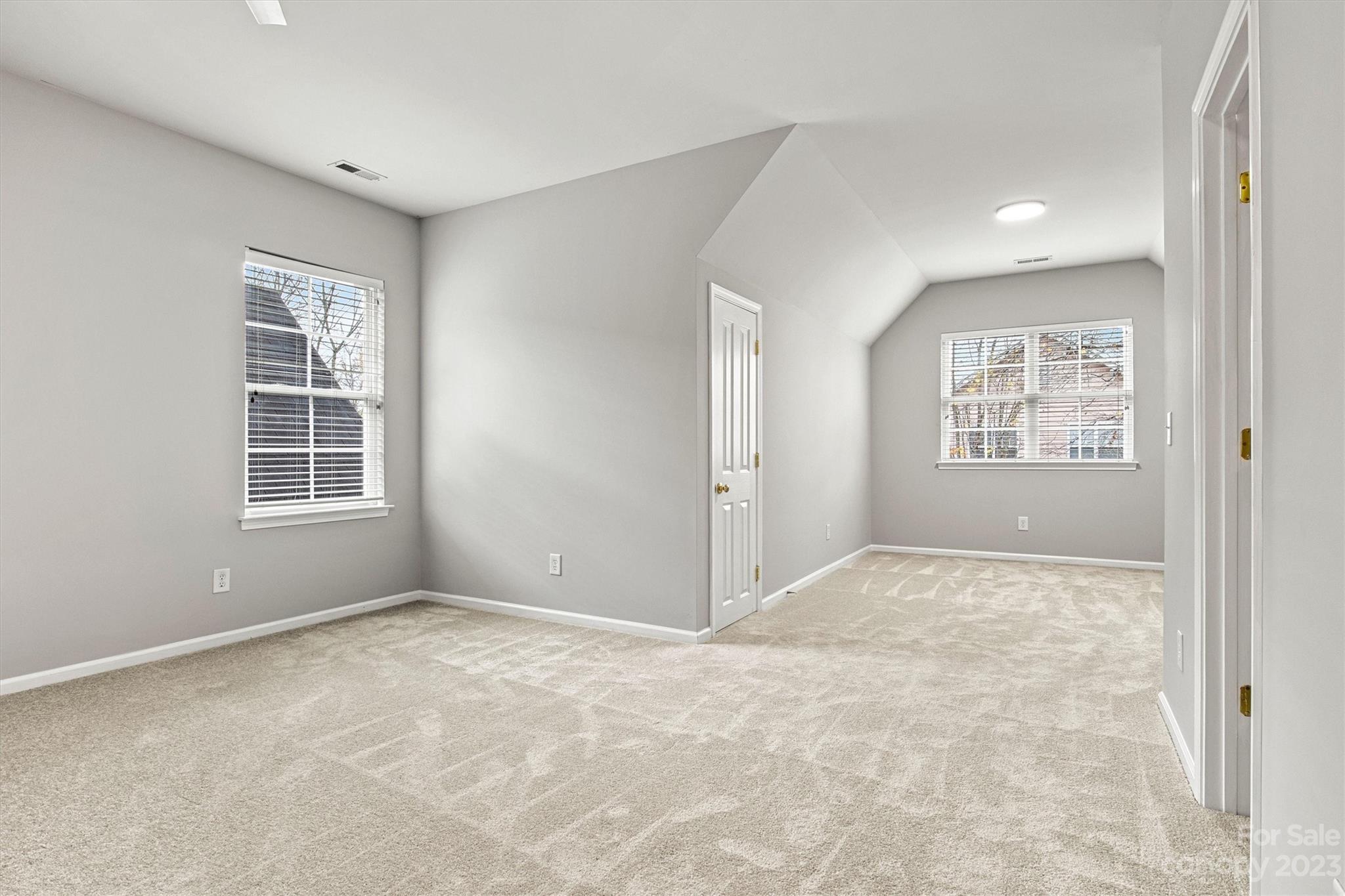 241 Faust Road Davidson, NC 28036 - Photo 15 of 29 a view of an empty room with a window