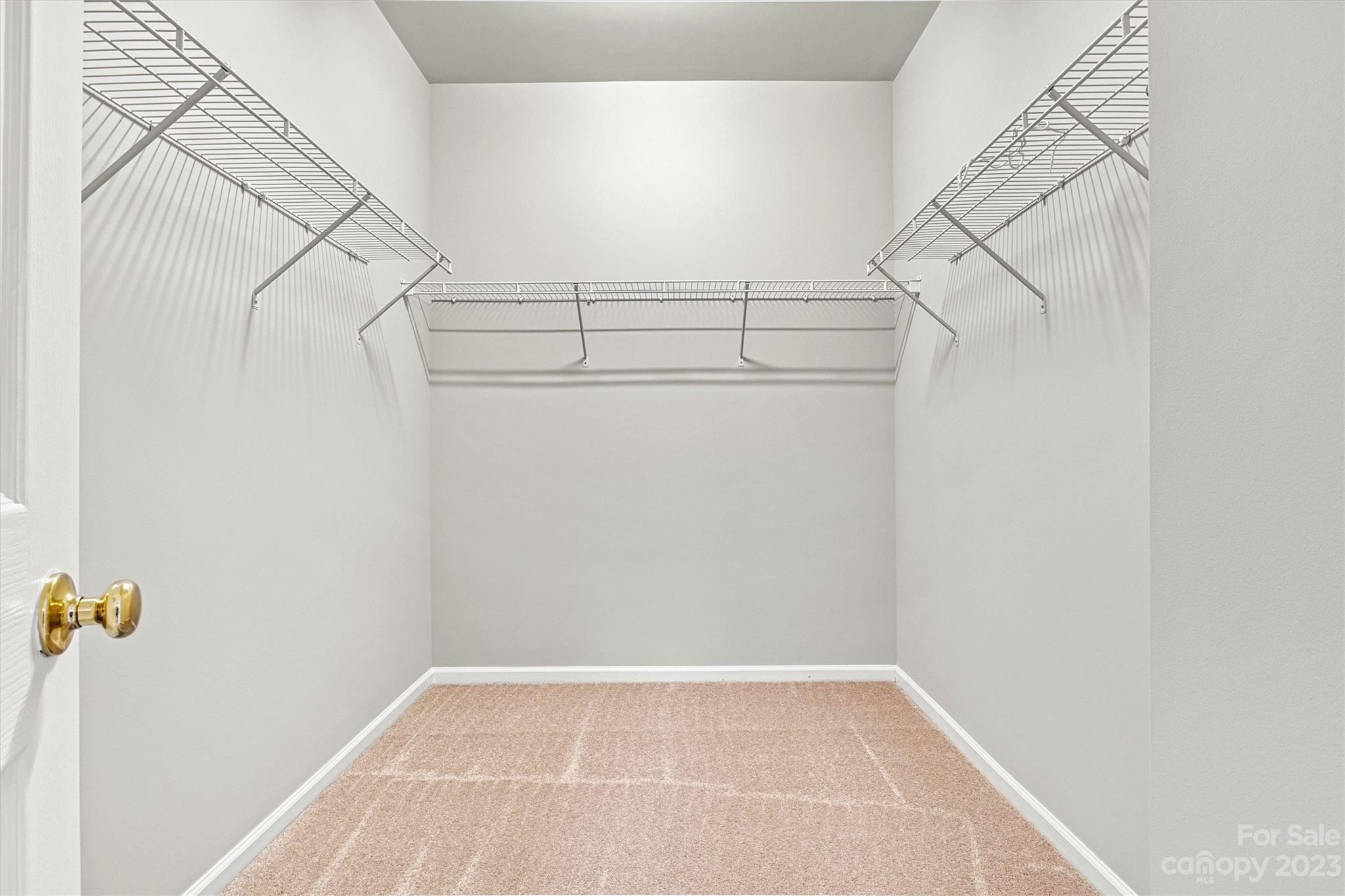 241 Faust Road Davidson, NC 28036 - Photo 17 of 29 a view of a room with racks on the wall