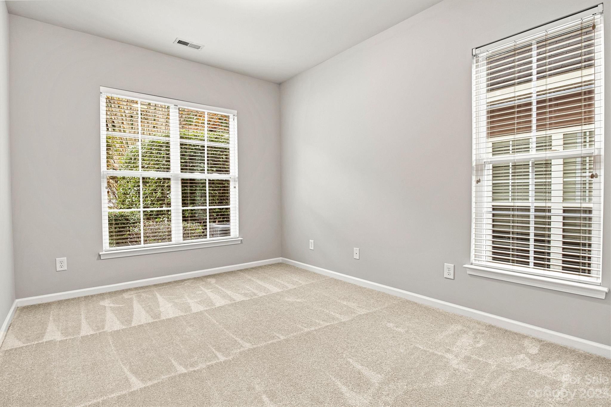 241 Faust Road Davidson, NC 28036 - Photo 20 of 29 a view of an empty room with a window