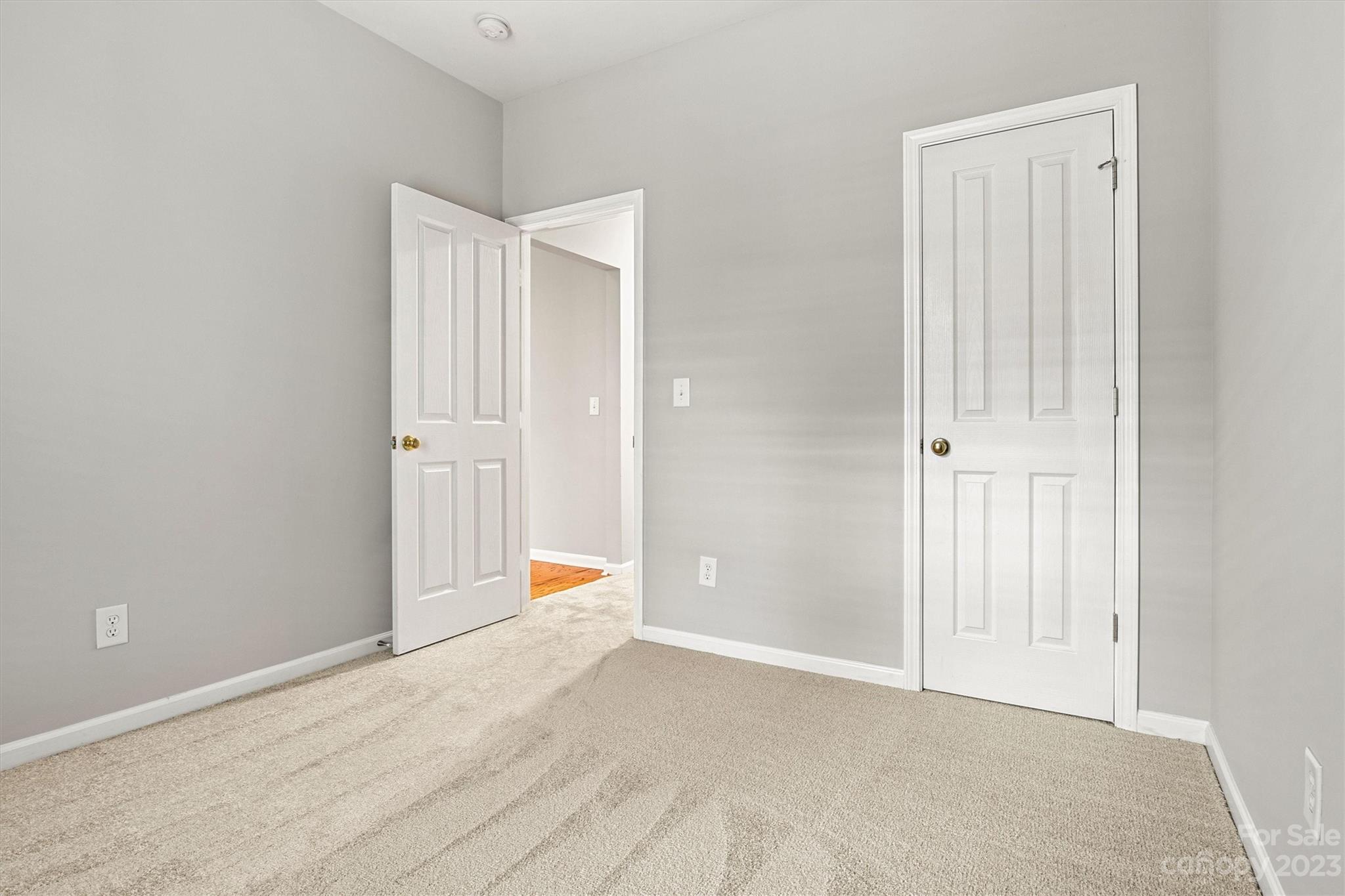 241 Faust Road Davidson, NC 28036 - Photo 24 of 29 an empty room with a empty space and window