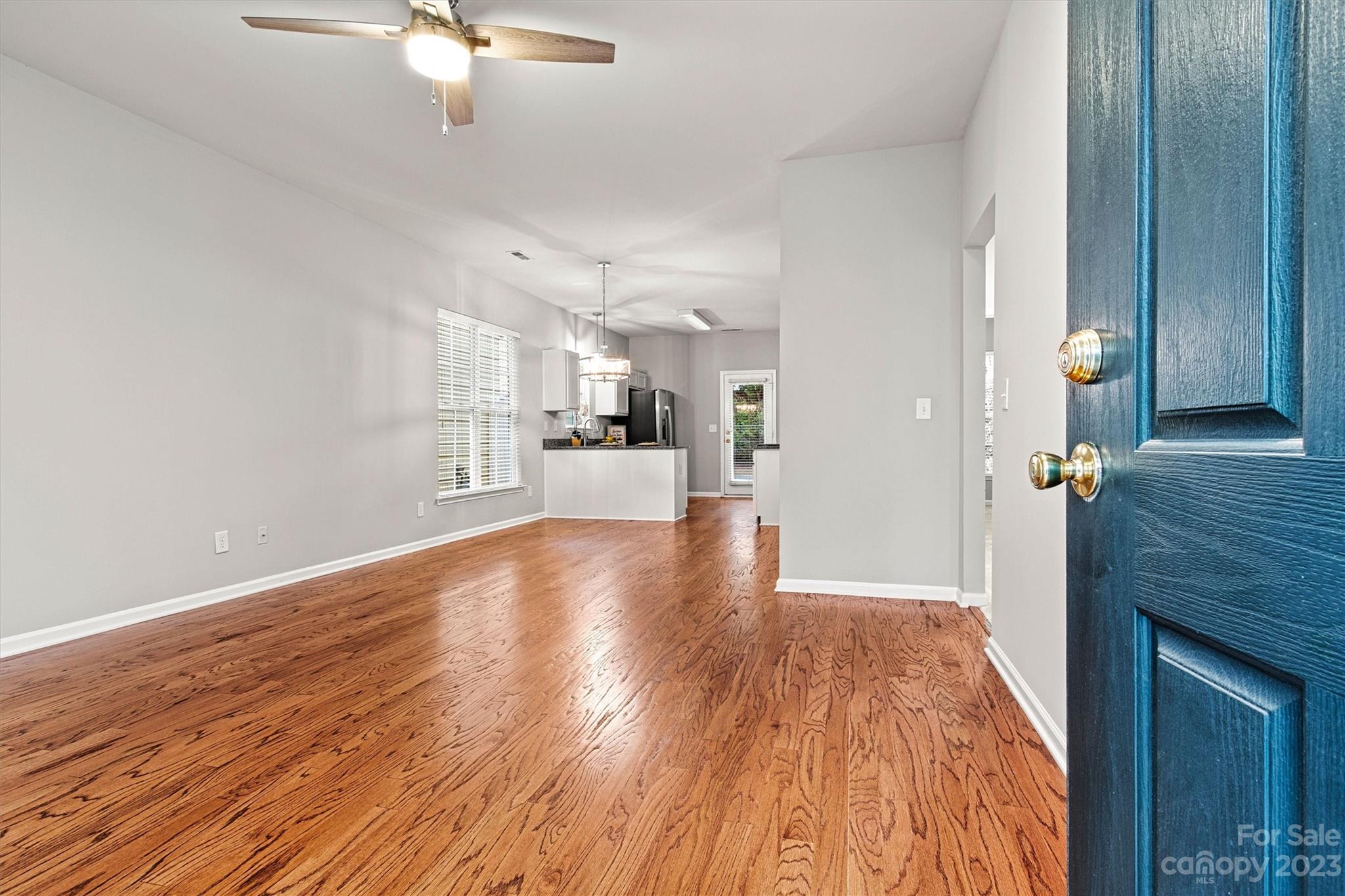 241 Faust Road Davidson, NC 28036 - Photo 4 of 29 a view of a livingroom with wooden floor