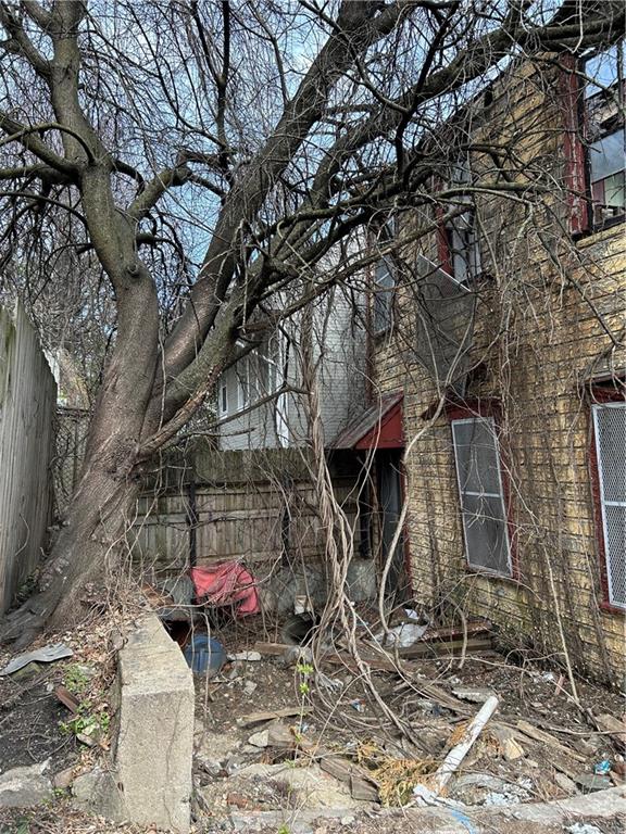 1000 Spring Garden Avenue Pittsburgh, PA 15212 - Photo 12 of 17 a backyard of a house with table and chairs