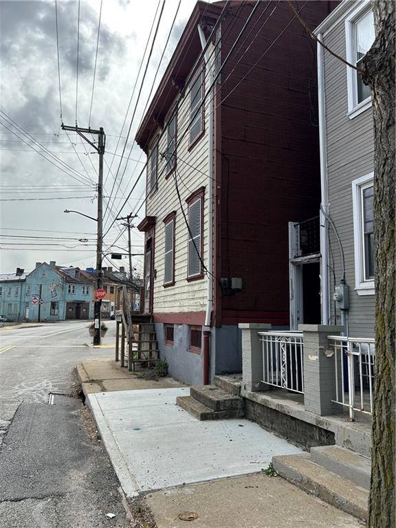 1000 Spring Garden Avenue Pittsburgh, PA 15212 - Photo 15 of 17 front view of a house with a porch