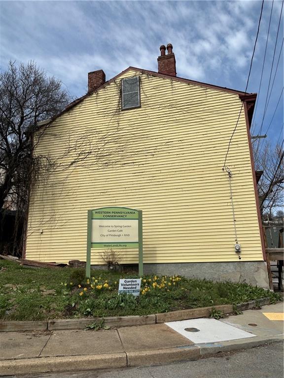 1000 Spring Garden Avenue Pittsburgh, PA 15212 - Photo 3 of 17 a front view of a house with trees