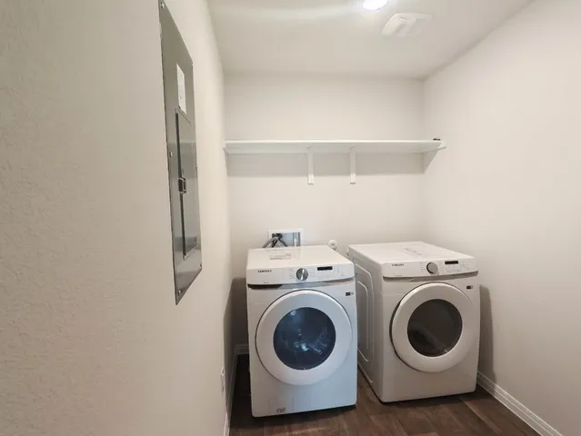 a utility room with dryer and washer