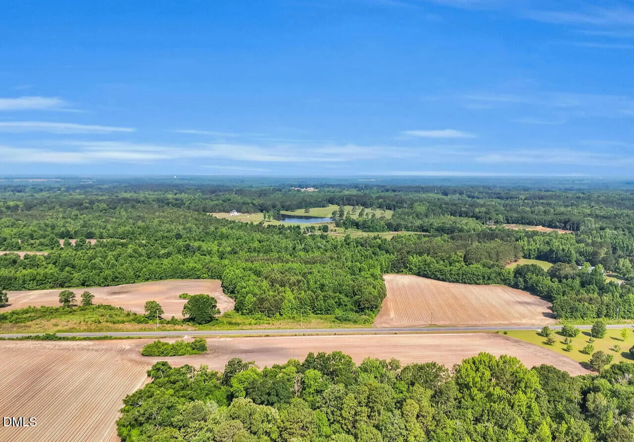 2044 Wire Road Bunnlevel, NC 28323 - Photo 5 of 8 a view of a lake with a big yard