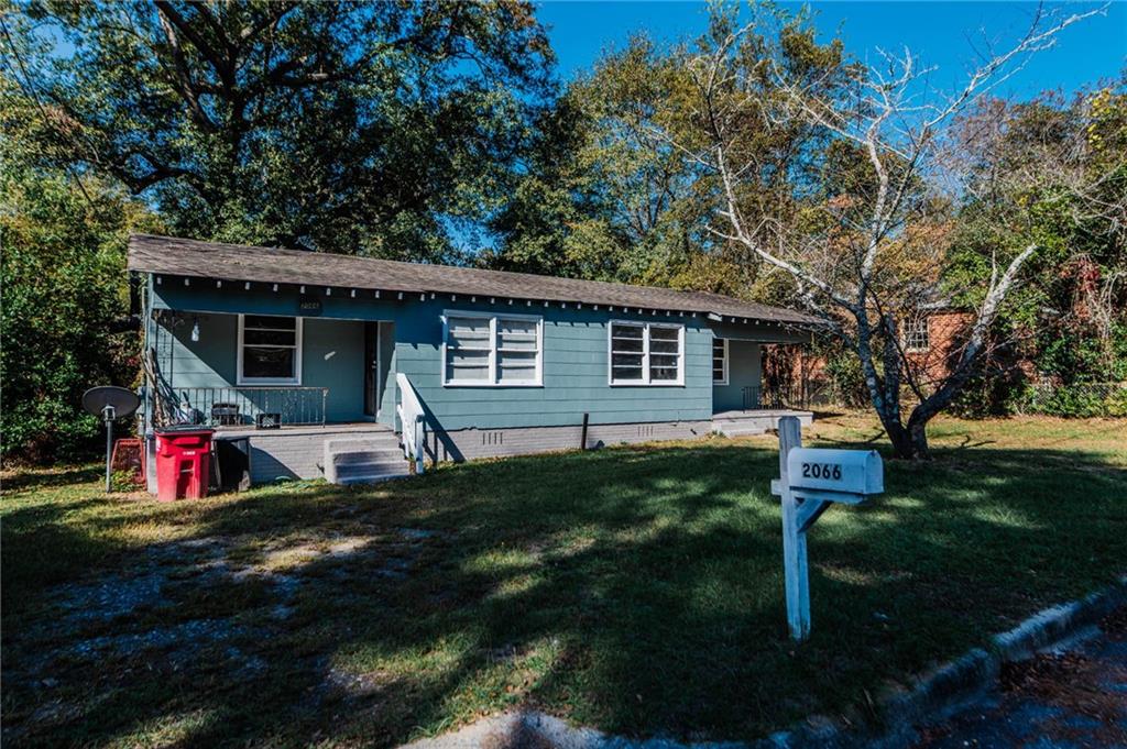 2066 Melton Avenue Macon, GA 31217 - Photo 1 of 2 a view of a house with backyard and garden