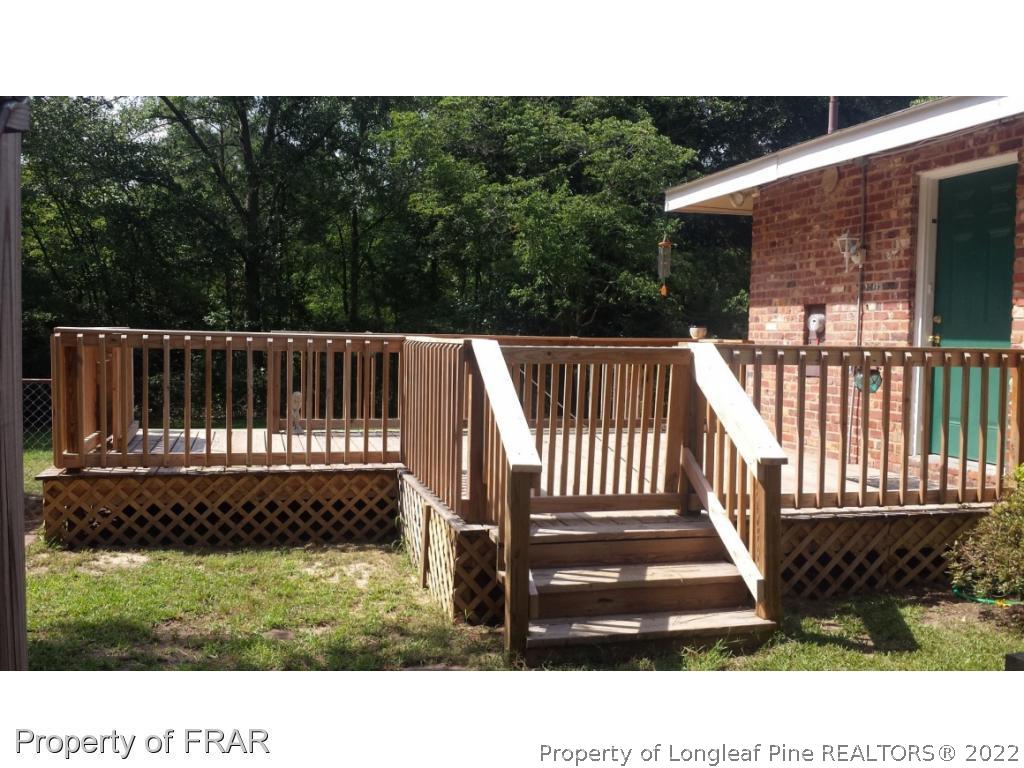 148 Ashemont Road Aberdeen, NC 28315 - Photo 13 of 18 a view of outdoor space and deck