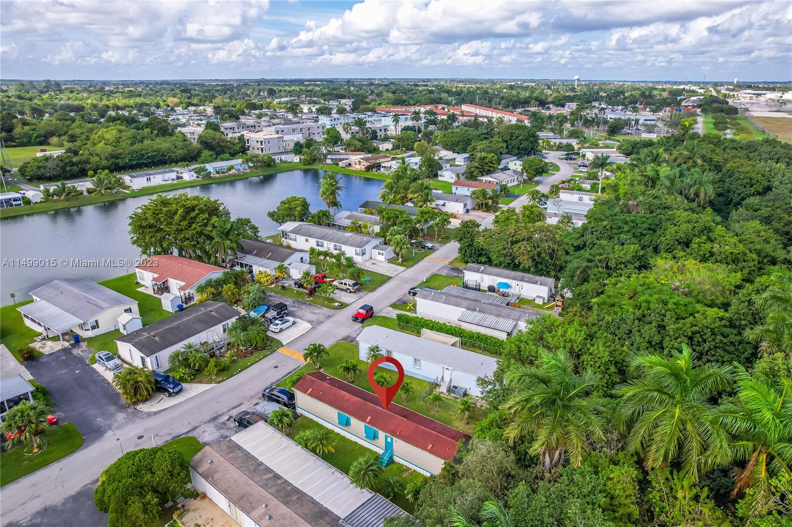 35250 Southwest 177th Court, Unit 77 Homestead, FL 33034 - Photo 26 of 30 an aerial view of residential house with outdoor space and lake view