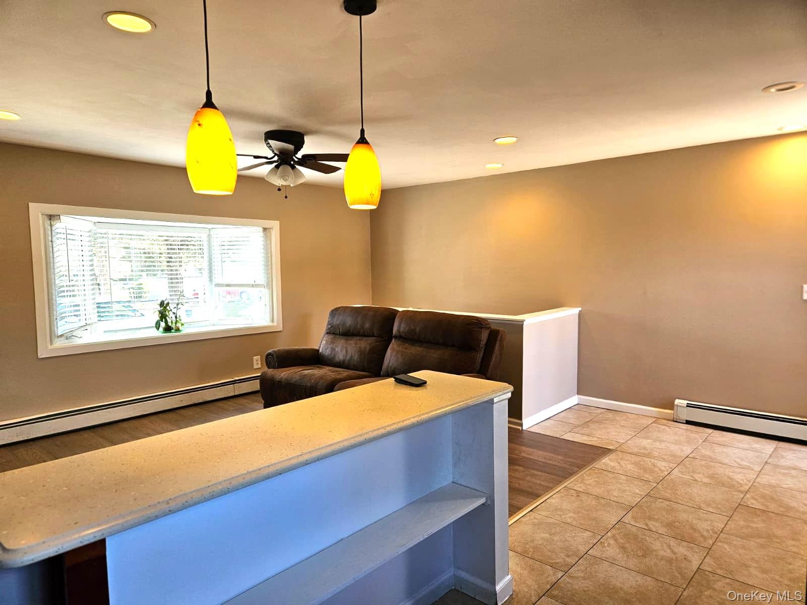 56 Applegate Drive Central Islip, NY 11722 - Photo 20 of 33 a view of an empty room with windows