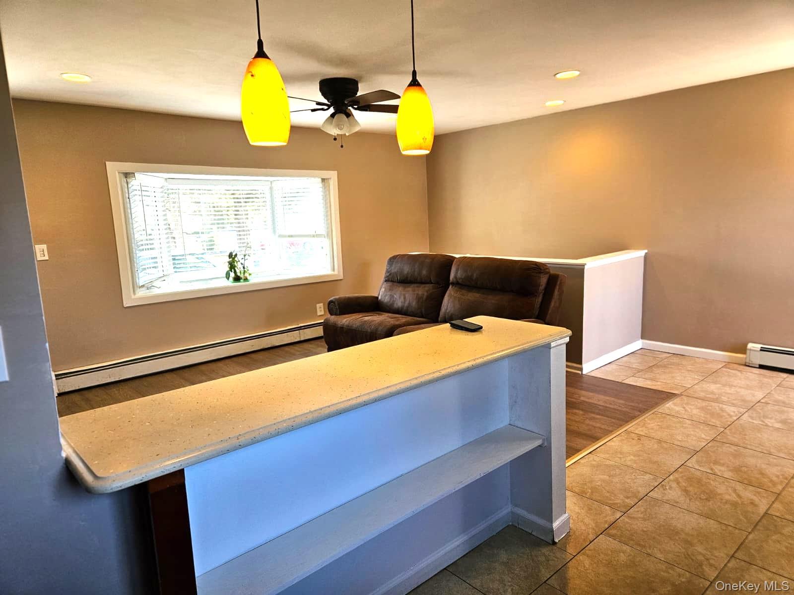 56 Applegate Drive Central Islip, NY 11722 - Photo 22 of 33 a view of an empty room with a window
