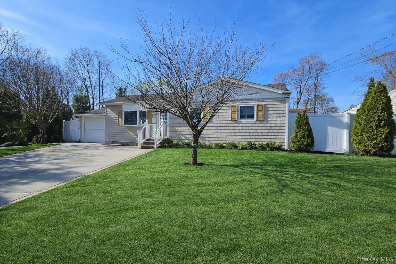 56 Applegate Drive Central Islip, NY 11722 - Photo 3 of 33 a house view with a garden space