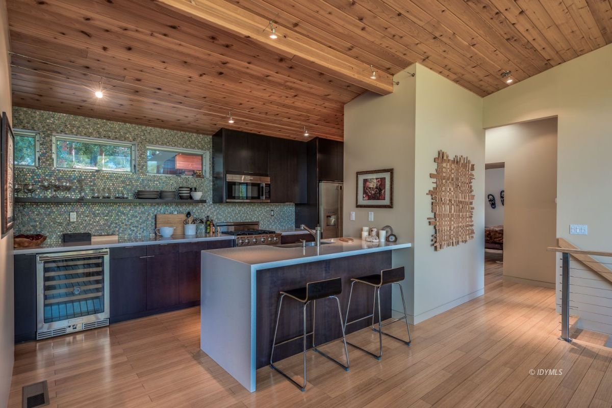 52522 Double View Drive Idyllwild, CA 92549 - Photo 33 of 72 a kitchen with stainless steel appliances granite countertop a stove and a refrigerator