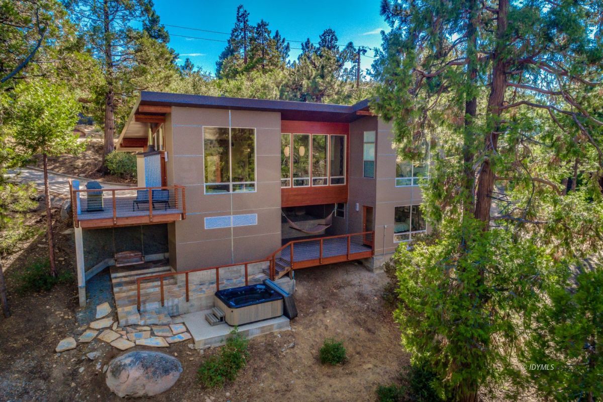 52522 Double View Drive Idyllwild, CA 92549 - Photo 5 of 72 a view of a chairs and table in backyard of the house