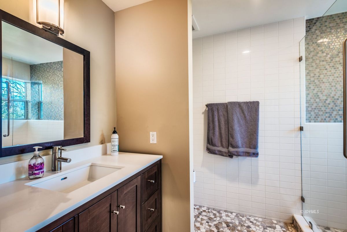 52522 Double View Drive Idyllwild, CA 92549 - Photo 45 of 72 a bathroom with a sink and mirror