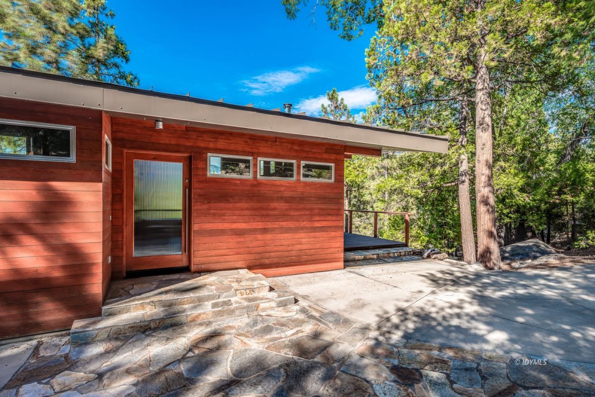 52522 Double View Drive Idyllwild, CA 92549 - Photo 8 of 72 a front view of a house with a yard