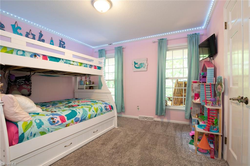 8308 Maloe Court Oak Ridge, NC 27310 - Photo 22 of 39 2nd Bedroom