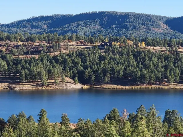 a view of a lake with a mountain