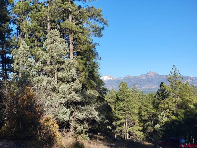 a view of a city with a mountain in the background
