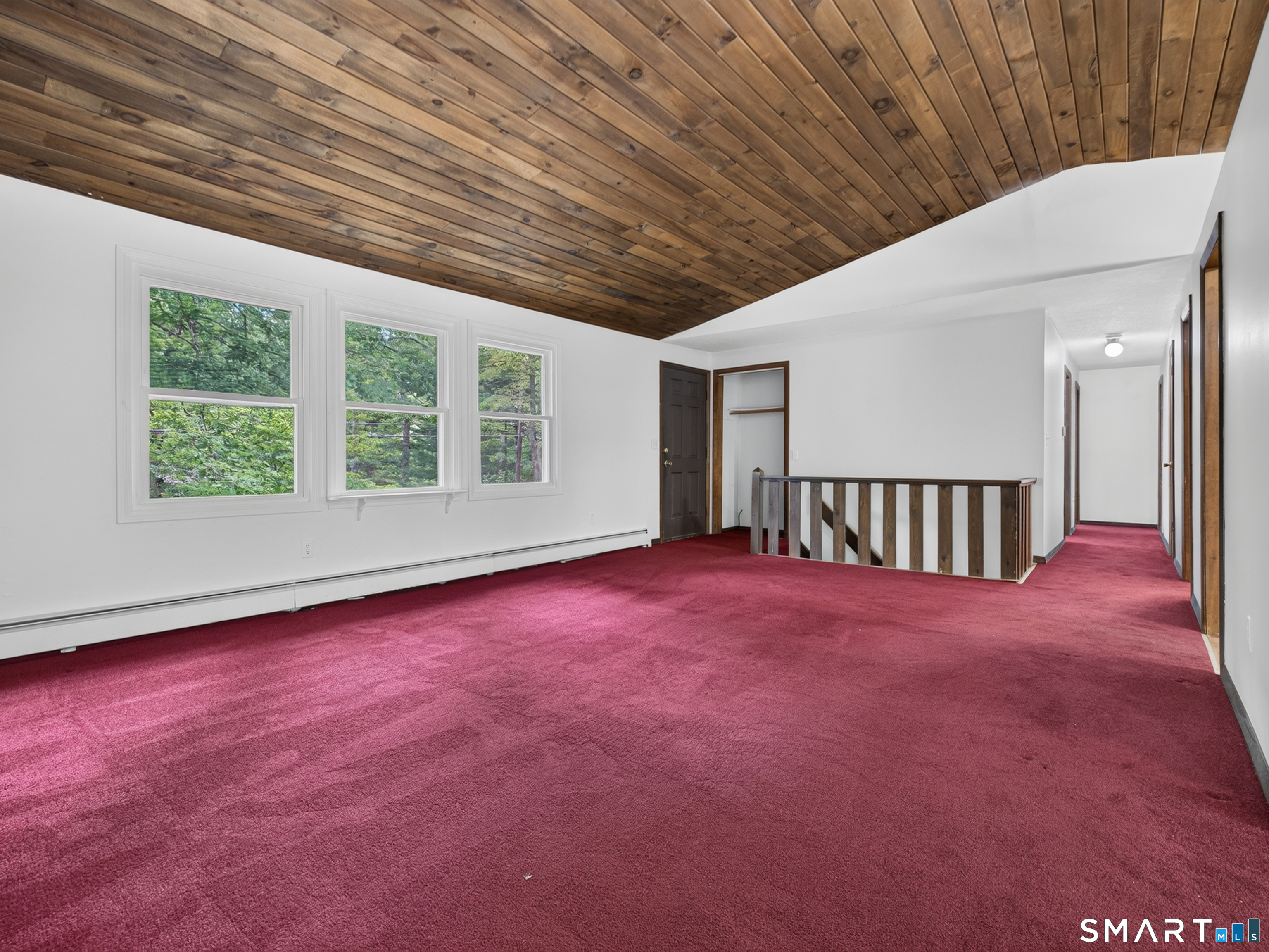 75 Airline Road Clinton, CT 06413 - Photo 3 of 37 a view of an empty room with a window