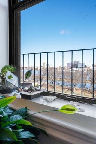 a view of swimming pool from a balcony
