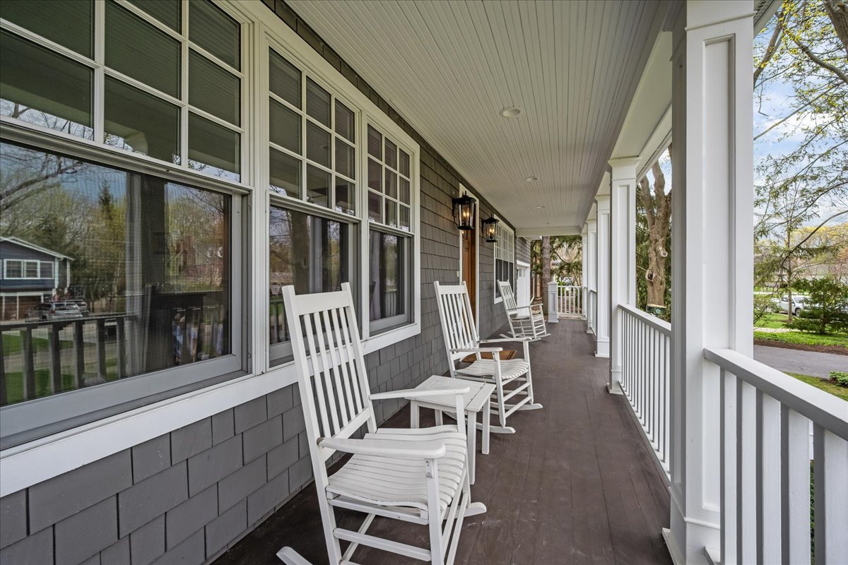 129 Ravine Forest Drive Lake Bluff, IL 60044 - Photo 3 of 50 a balcony with wooden floor and outdoor seating