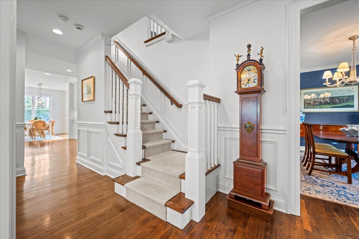 129 Ravine Forest Drive Lake Bluff, IL 60044 - Photo 6 of 50 a view of entryway and hall with wooden floor