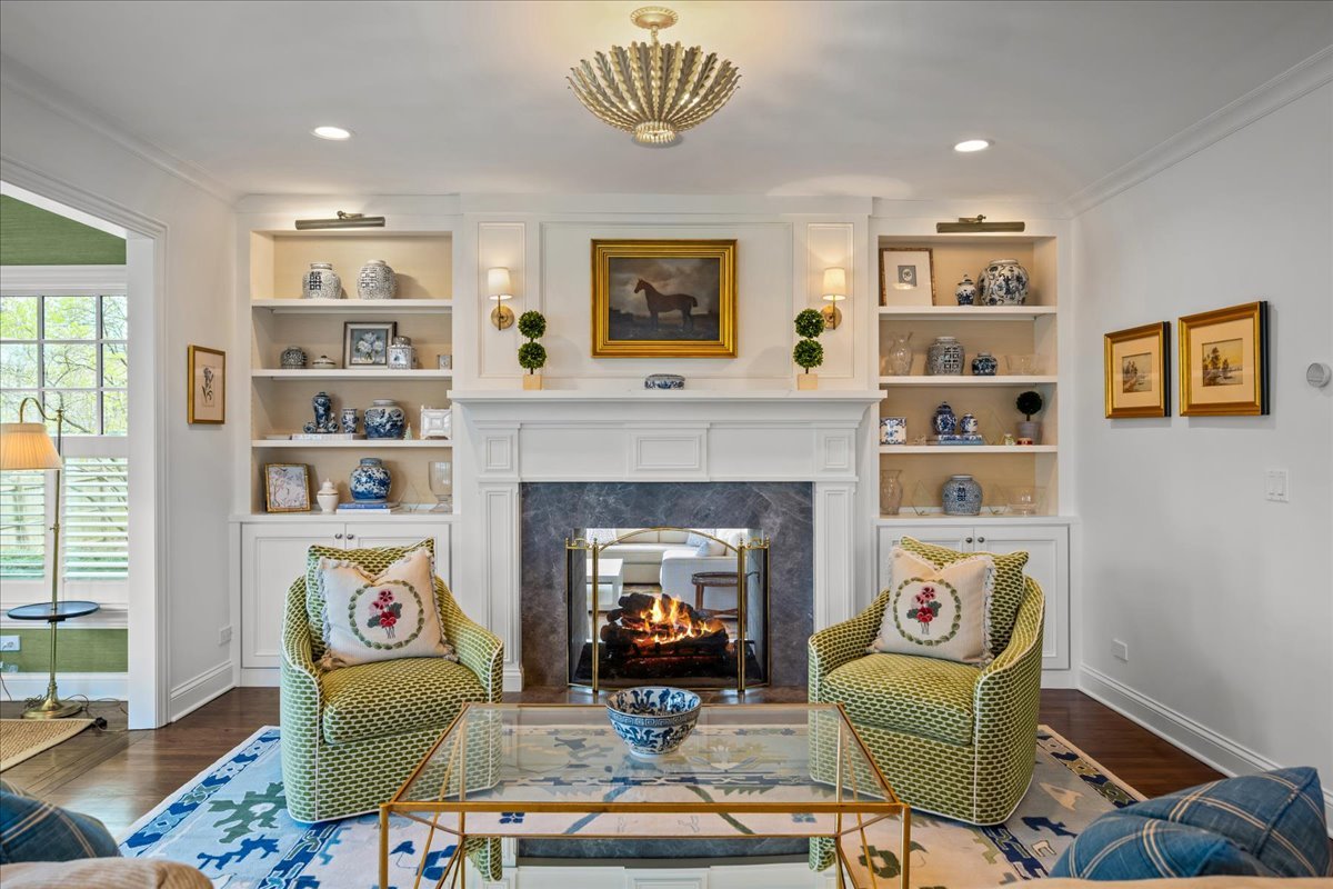 129 Ravine Forest Drive Lake Bluff, IL 60044 - Photo 9 of 50 a living room with furniture and a fireplace
