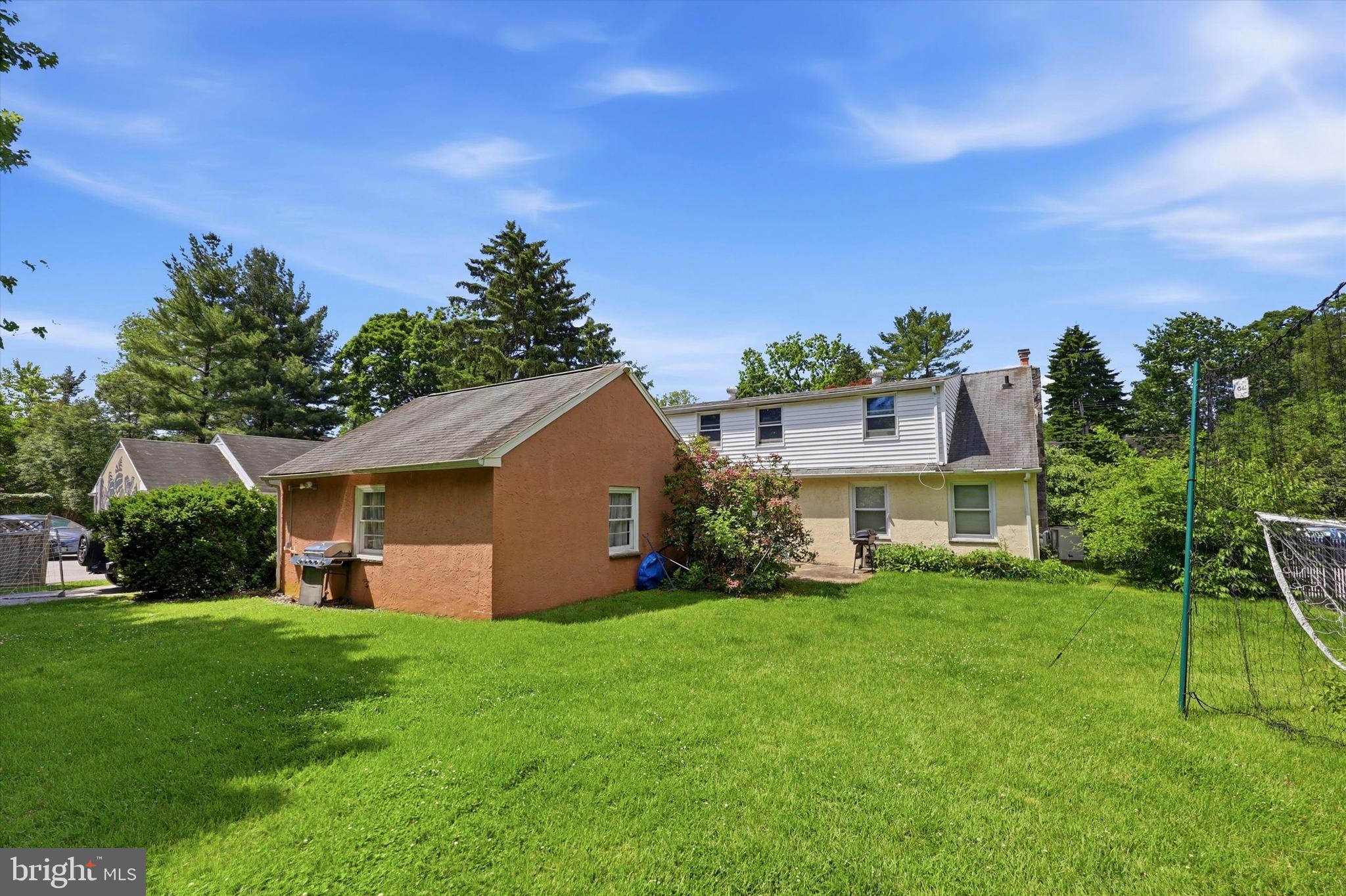 39 Haverford Road Ardmore, PA 19003 - Photo 23 of 24 a front view of a house with a yard and green space