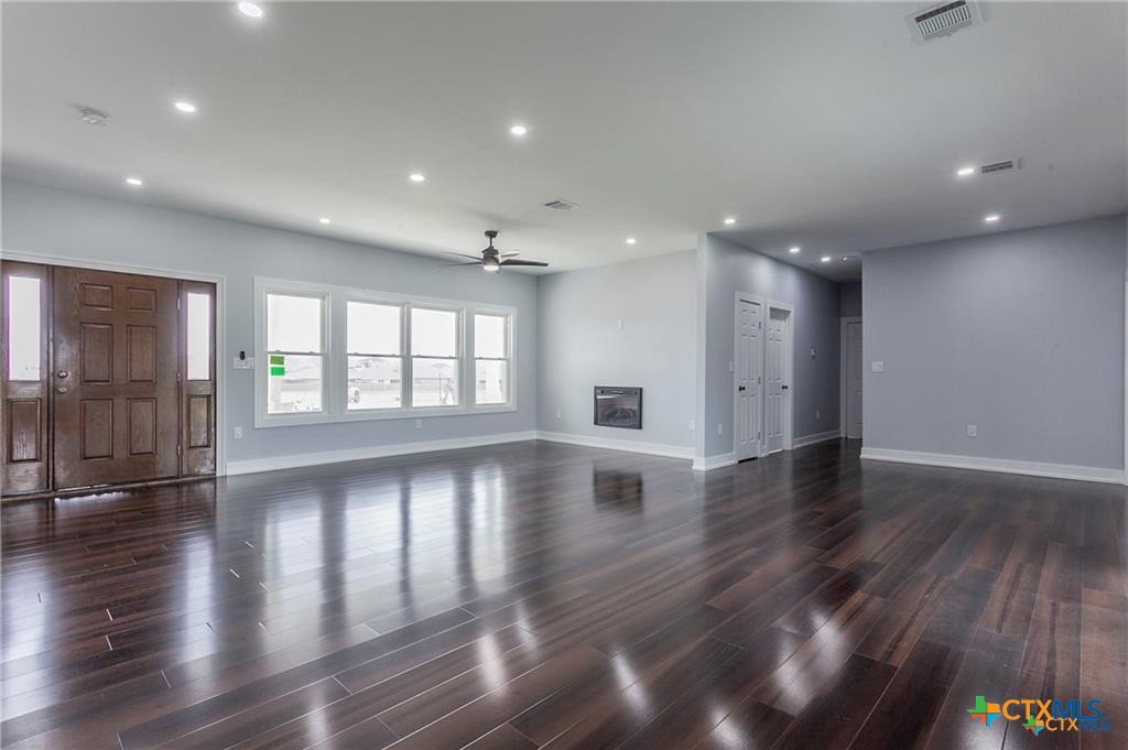 1110 North 42nd Street Temple, TX 76501 - Photo 6 of 32 a view of an entryway with wooden floor