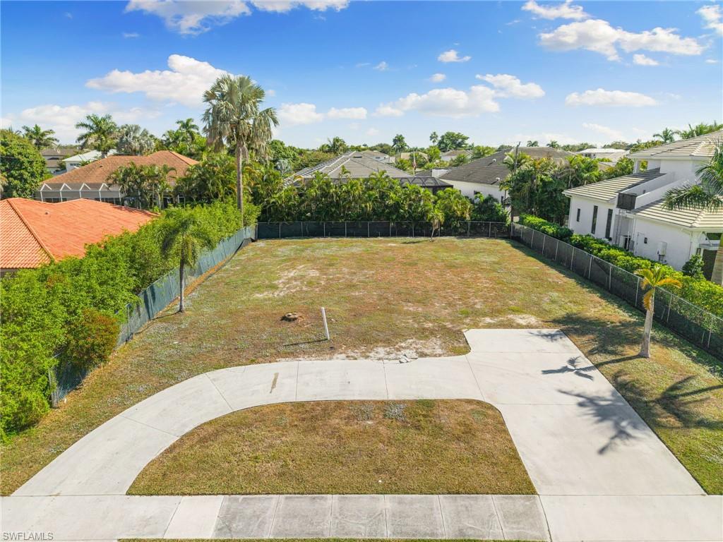 3670 Crayton Road Naples, FL 34103 - Photo 5 of 12 a view of a backyard