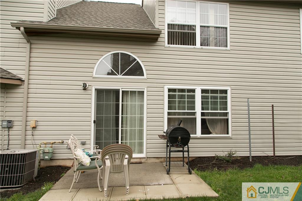 182 Nebula Road, Unit 182 Piscataway, NJ 08854 - Photo 15 of 23 a front view of a house with a patio
