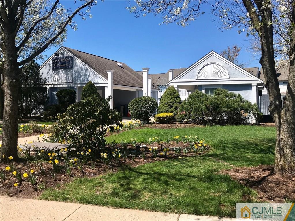 182 Nebula Road, Unit 182 Piscataway, NJ 08854 - Photo 17 of 23 a front view of a house with garden