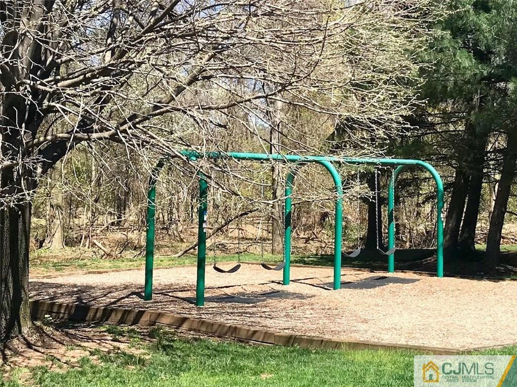 182 Nebula Road, Unit 182 Piscataway, NJ 08854 - Photo 21 of 23 a view of a yard with basketball court