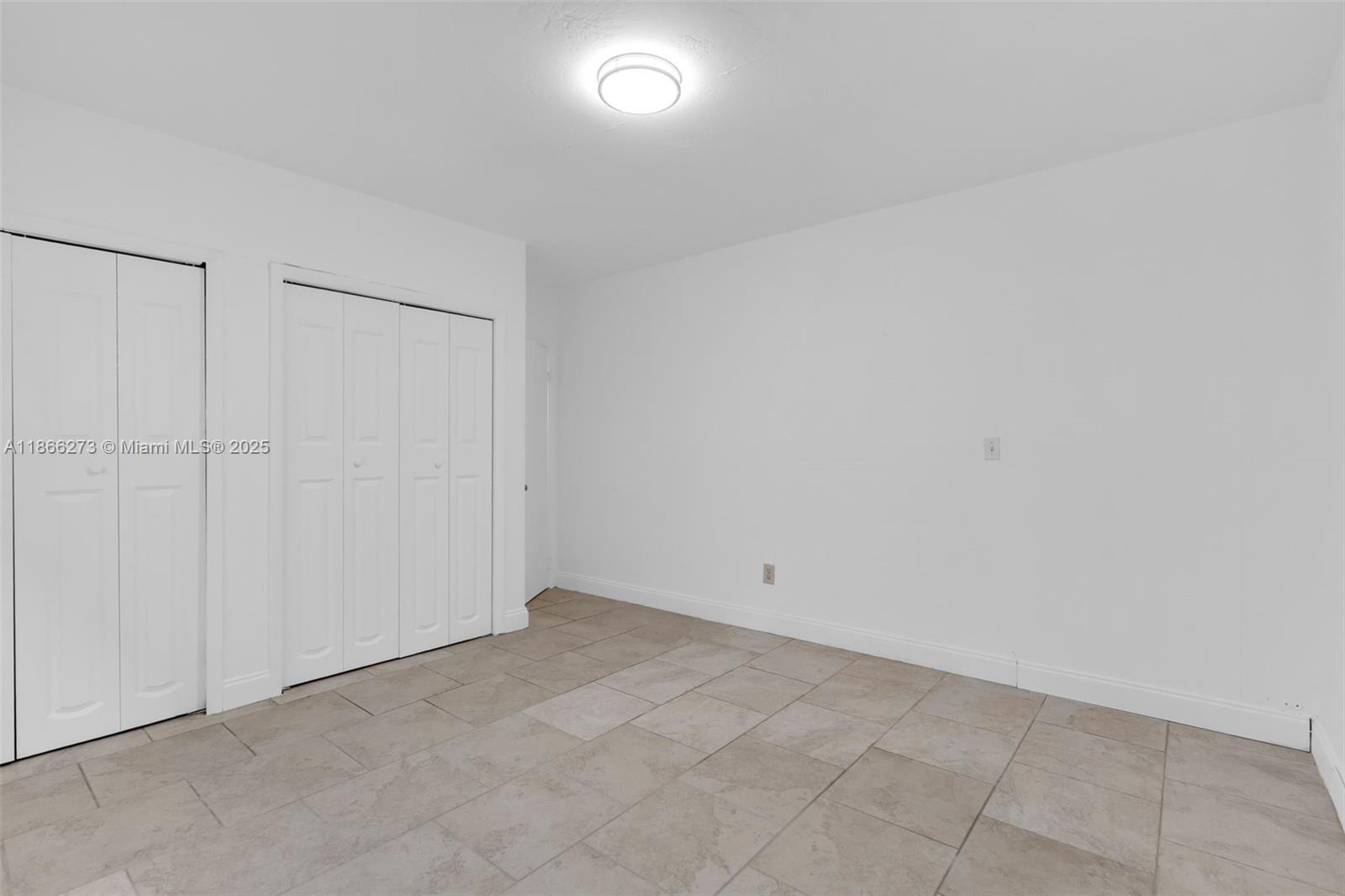 7424 Byron Avenue, Unit 2B Miami Beach, FL 33141 - Photo 11 of 25 a view of an empty room